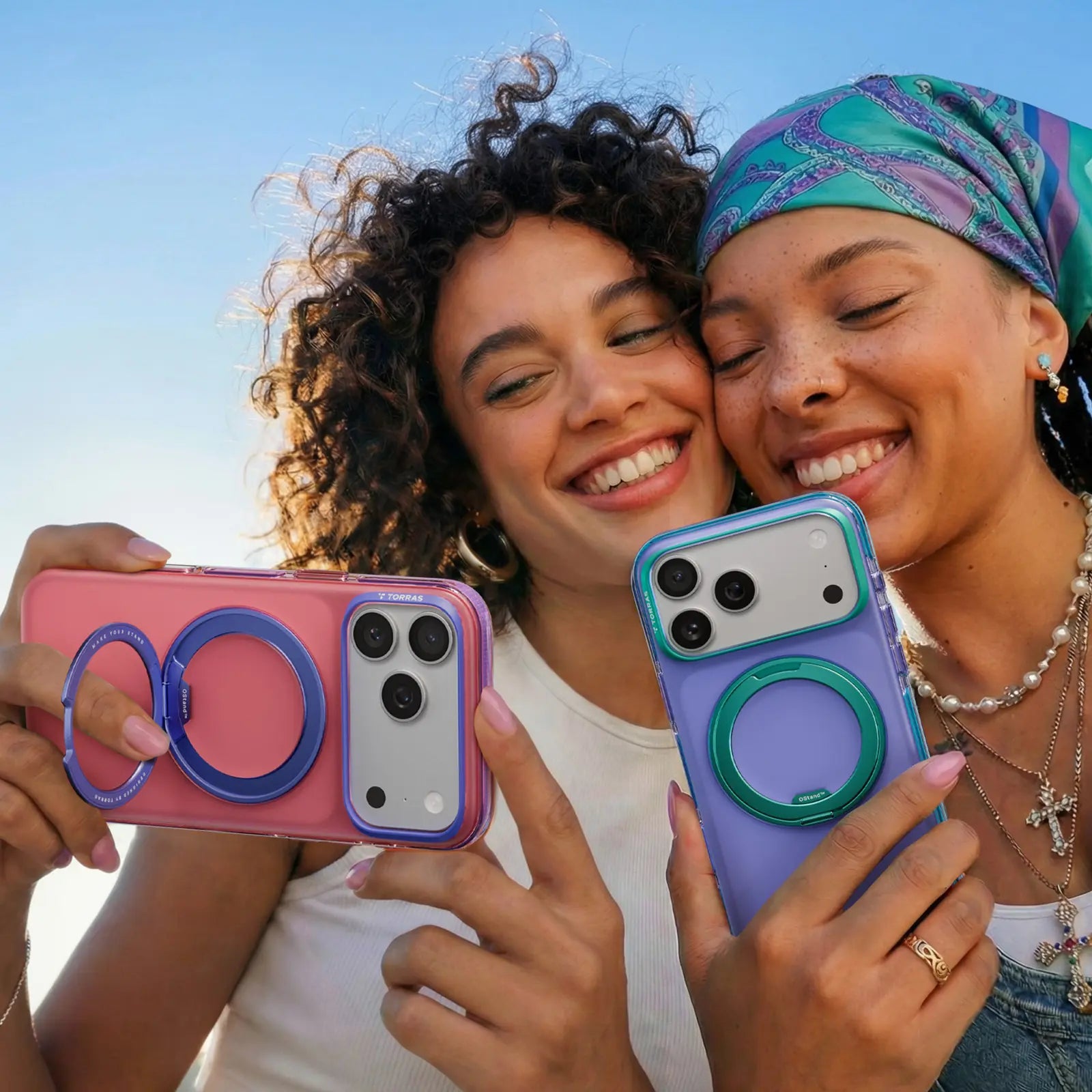 Ostand O3 Hue iPhone 17 Pro Max case with ring stand: pink (blue ring), purple (green ring).
